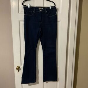 Dark blue Levi’s bootcut jeans. 33” waist